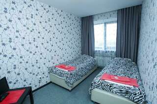 Гостиница Guest House Gold Oven Чебоксары Двухместный номер с 2 отдельными кроватями и общим туалетом-1